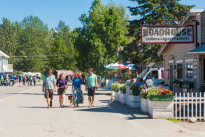 Four people walking in downtown Talkeetna